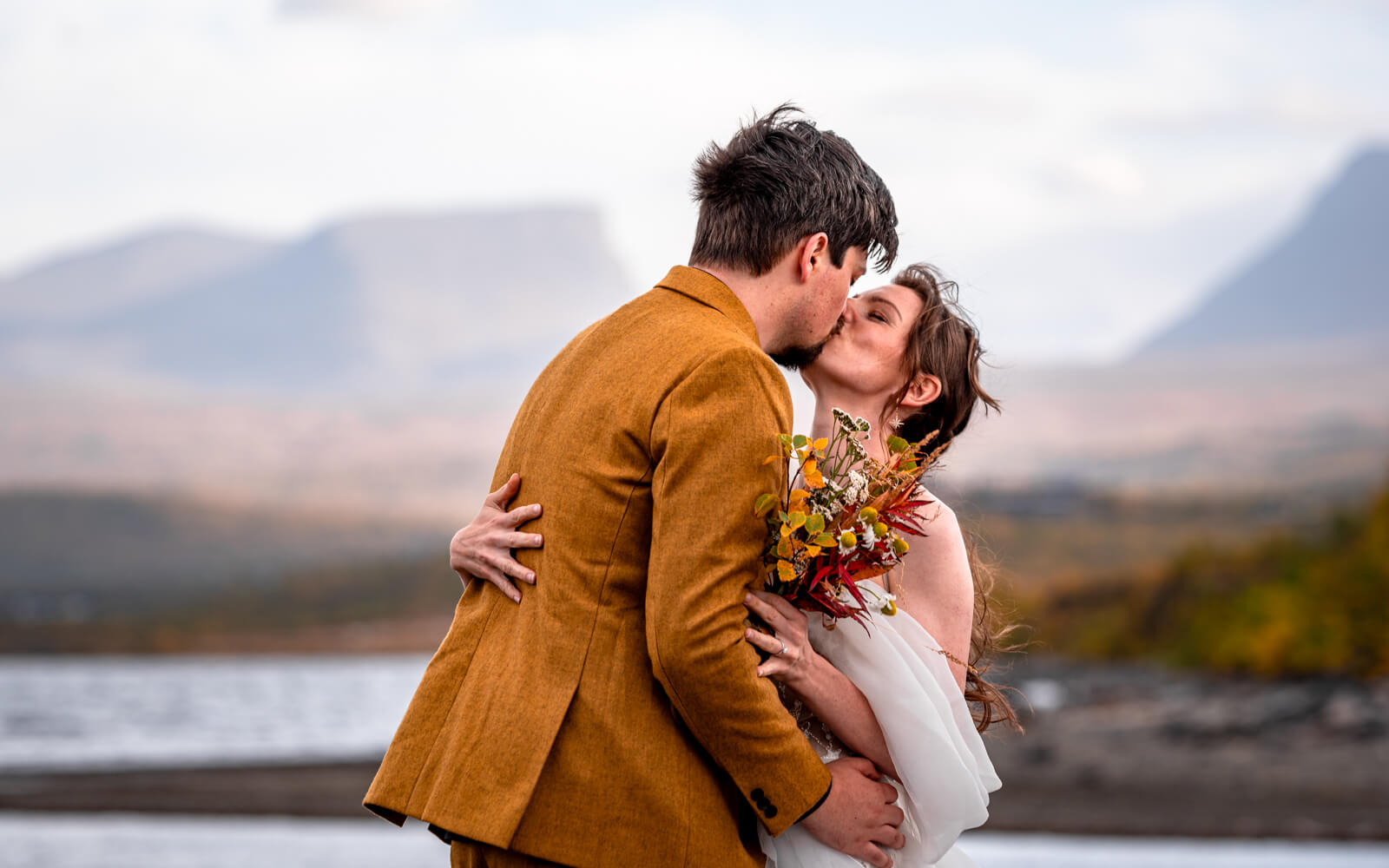 First kiss of a freshly married couple in Abisko national park