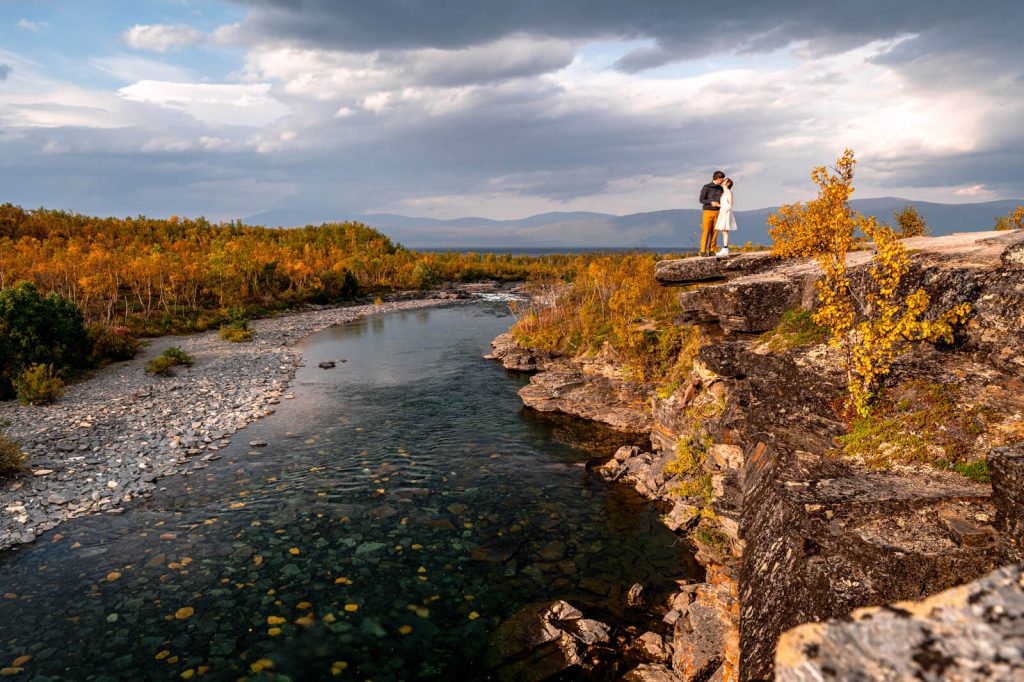 An eloping couple on a cliff at Abisko national park