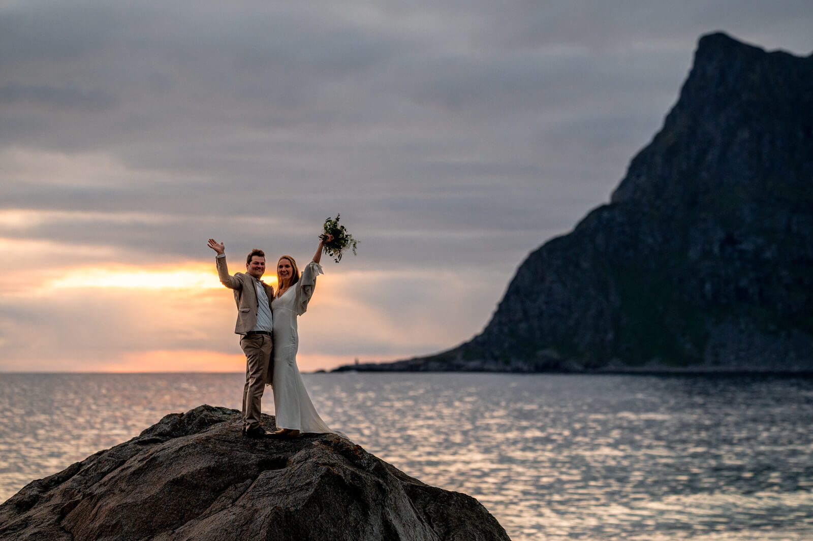Wedding couple enjoying their elopment on a small empty island
