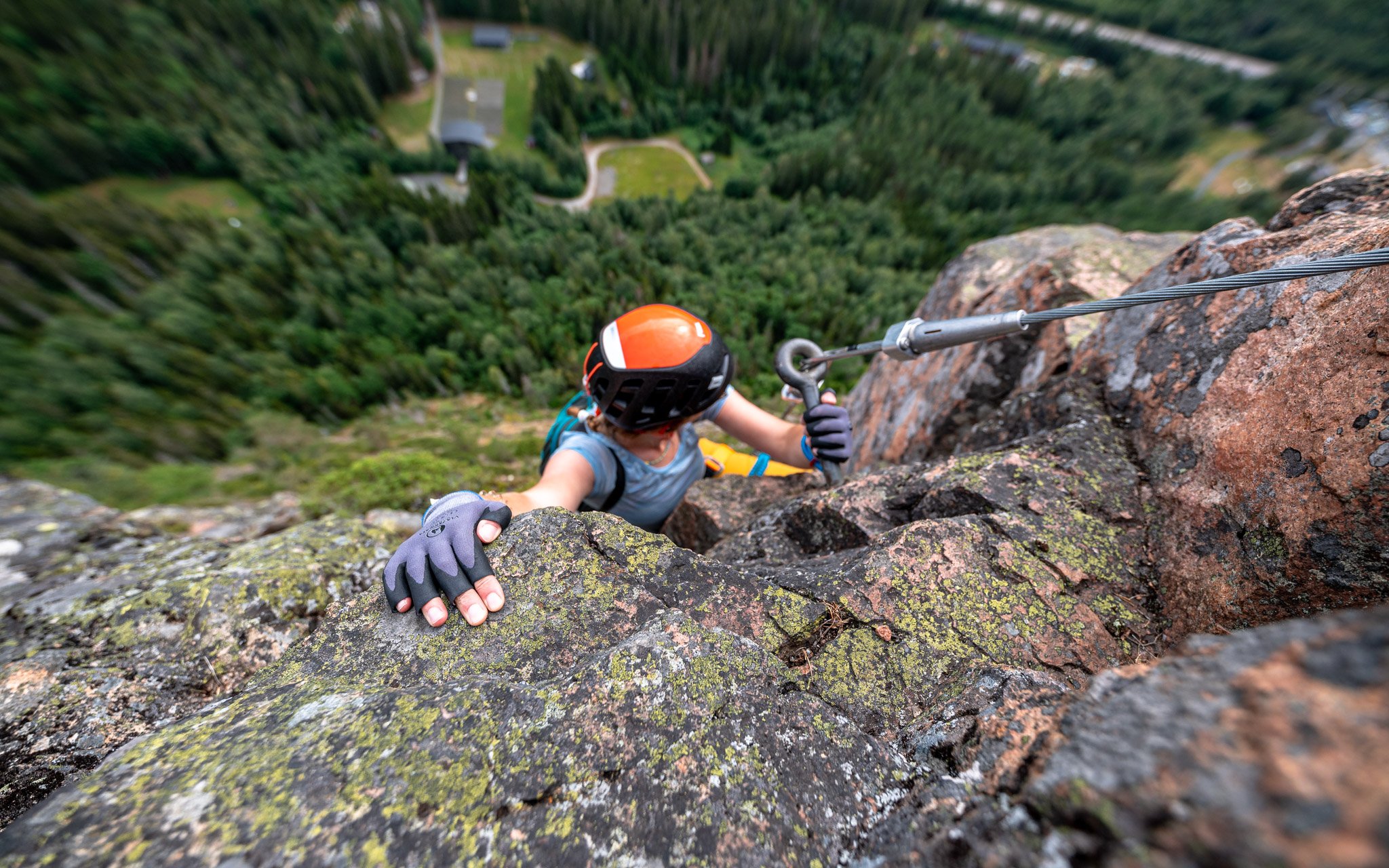 Climber at via ferrata in Höga Kusten, Sweden